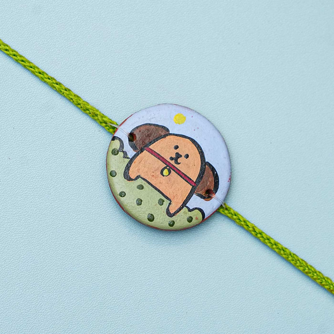 Personalized Animal Theme Terracotta Rakhi With Roli Chawal For Kids 1 - Close-up of Circular Charm