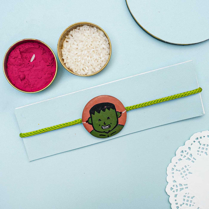 Hand-painted Hulk Terracotta Rakhi With Roli Chawal for Kids
