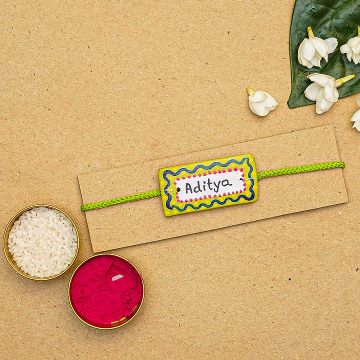 Personalized Terracotta Rectangle Rakhi With Roli Chawal