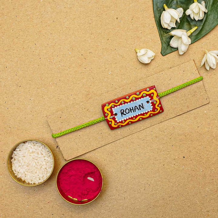 Personalized Terracotta Rectangle Rakhi With Roli Chawal