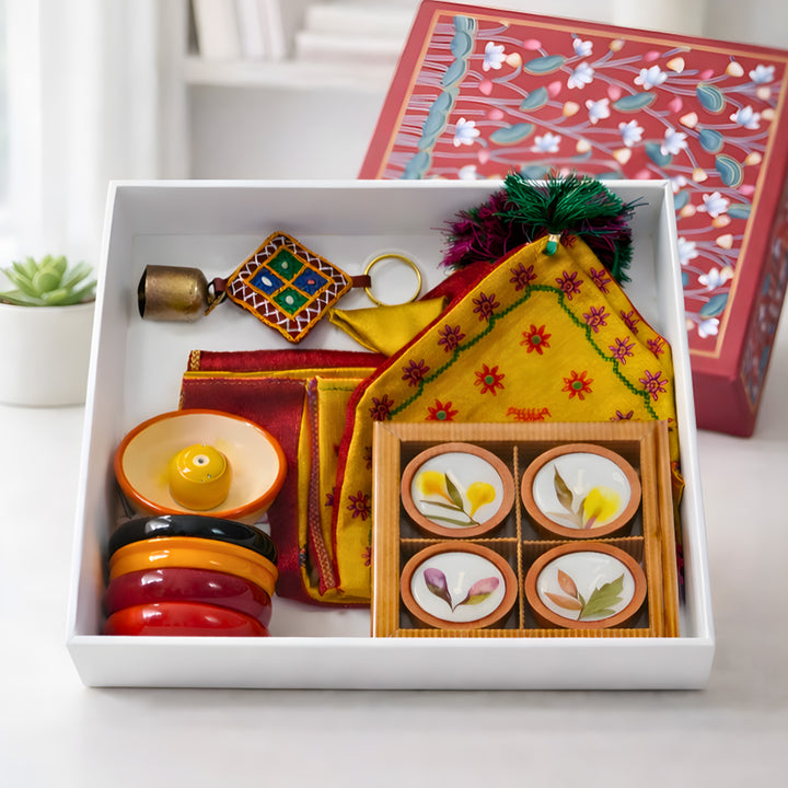 "Pichwai" Handmade Gift Hamper With Kasuti Toran, Etikoppaka Holders & Terracotta Candles For Festive Gifting
