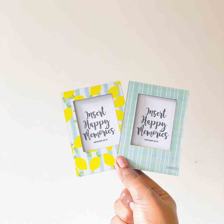 Printed Monogram Desk Initial With Polaroid Photo Frame - Hand Holding Two Picture Frames