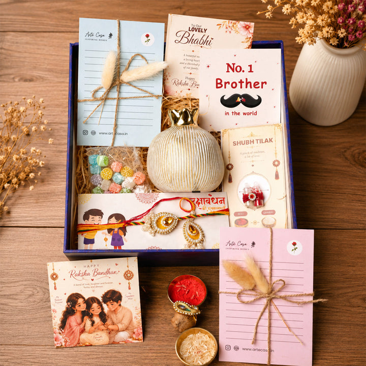 Ivory Pomegranate Porcelain Vase Rakhi Hamper With Rakhi Set For Bhaiya Bhabhi