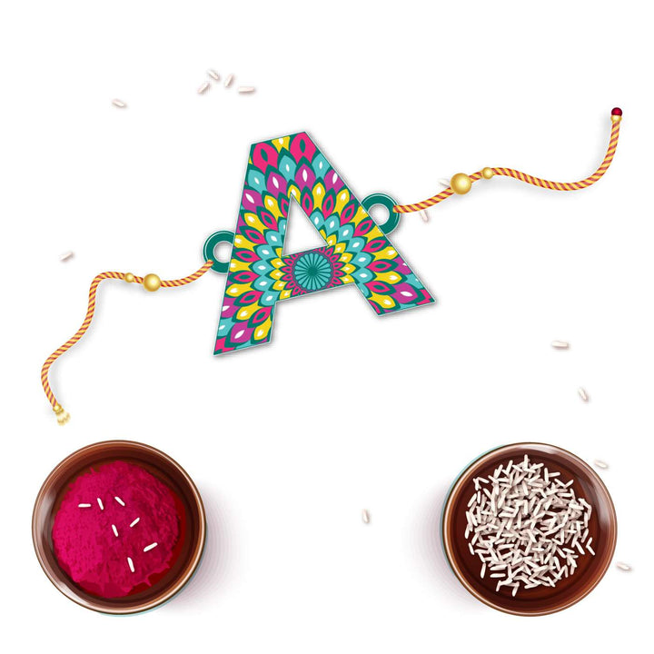 Personalized Handmade Printed Alphabet Wooden Rudraksha Rakhi With Roli Chawal - Top View with Accessories