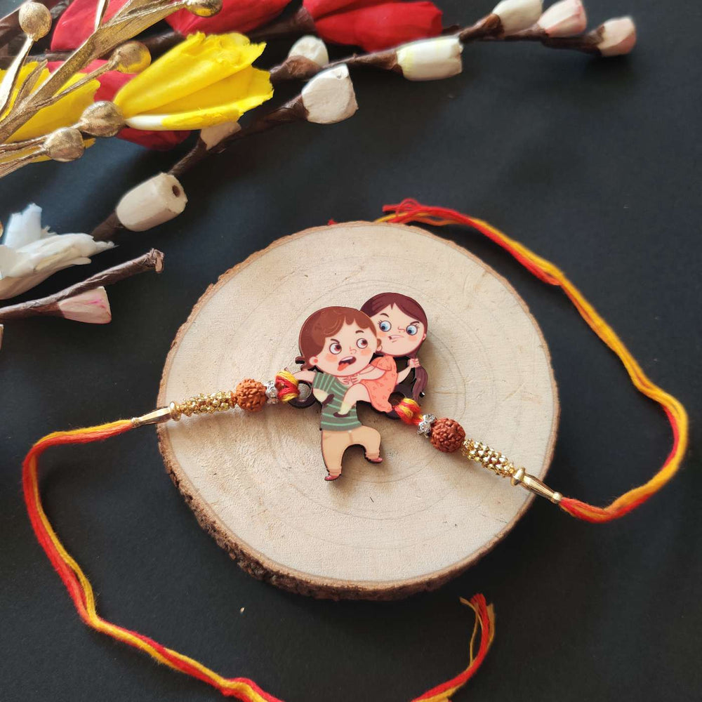 Handmade Printed Annoying Brother Wooden Rudraksha Rakhi With Roli Chawal - Close-up on Rakhi thread