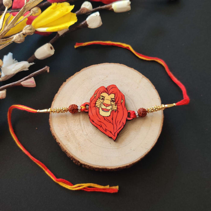 Handmade Printed Lion King Wooden Rudraksha Rakhi With Roli Chawal