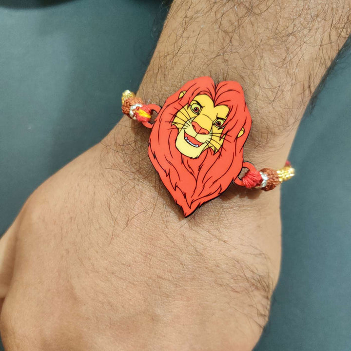 Handmade Printed Lion King Wooden Rudraksha Rakhi With Roli Chawal