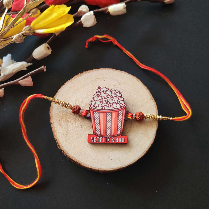 Handmade Printed Netflix Wooden Rudraksha Rakhi With Roli Chawal