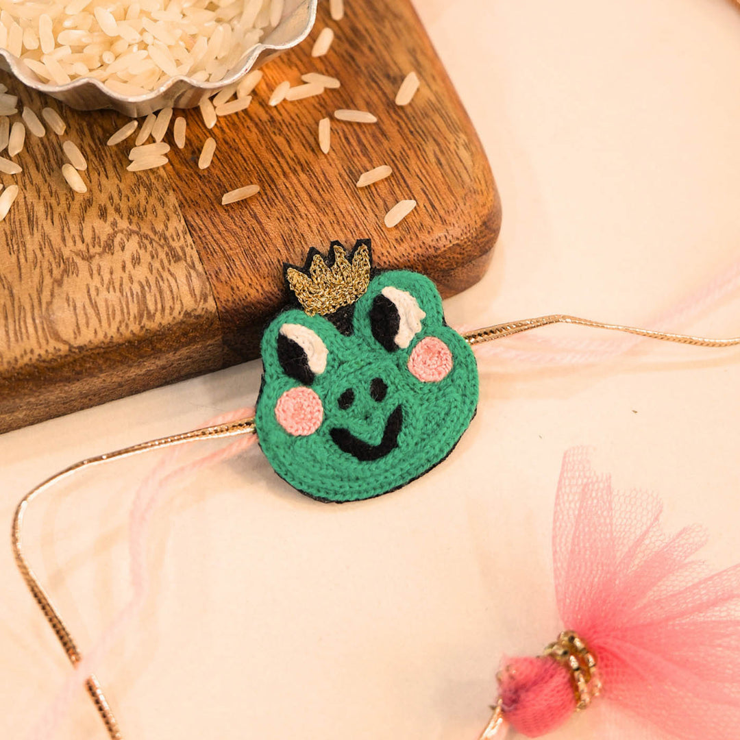 Handmade Thread Embroidered "Frog Prince" Reusable Rakhi Magnet For Brother