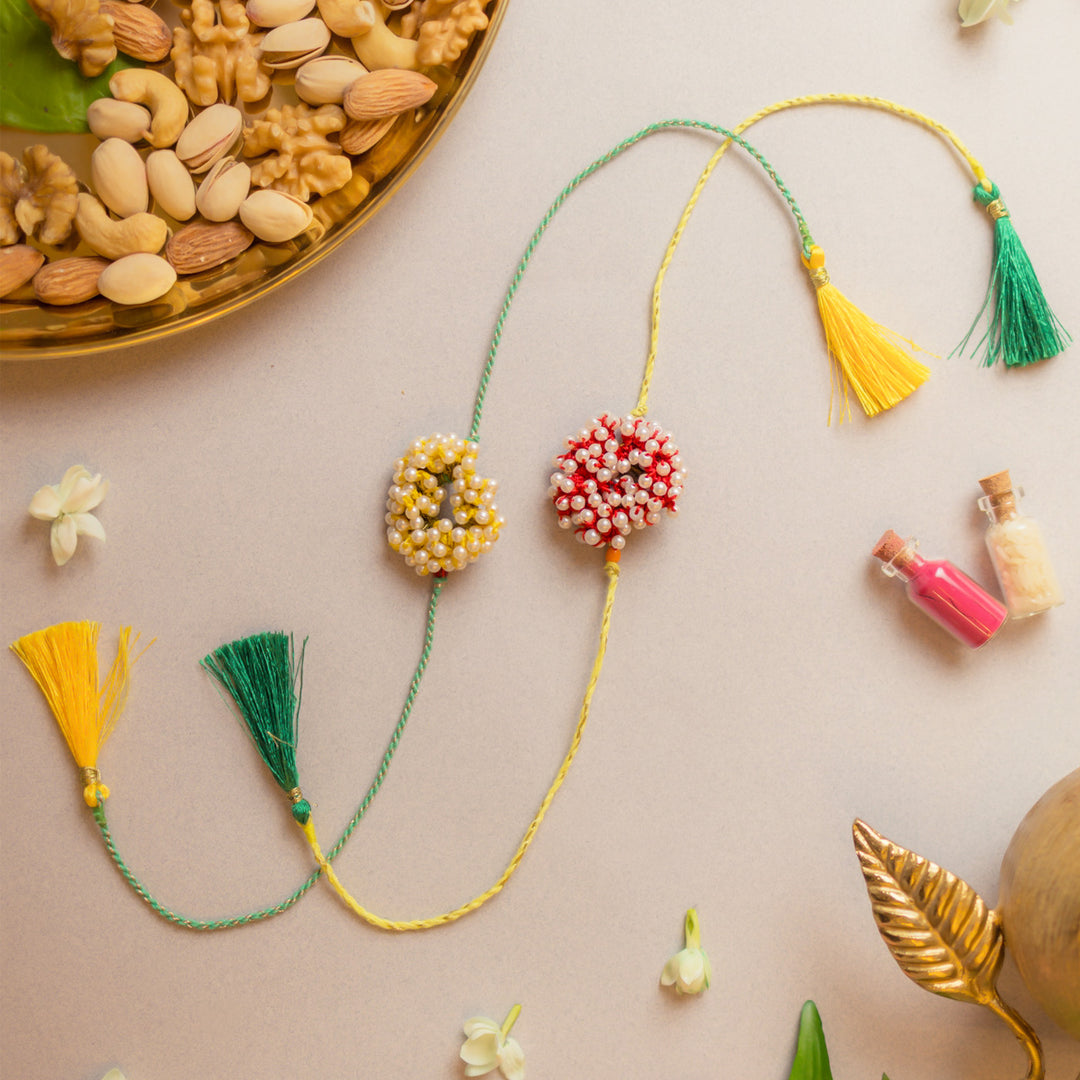 Intricate Crochet Beaded Coral Rakhi With Roli Chawal | Set of 2
