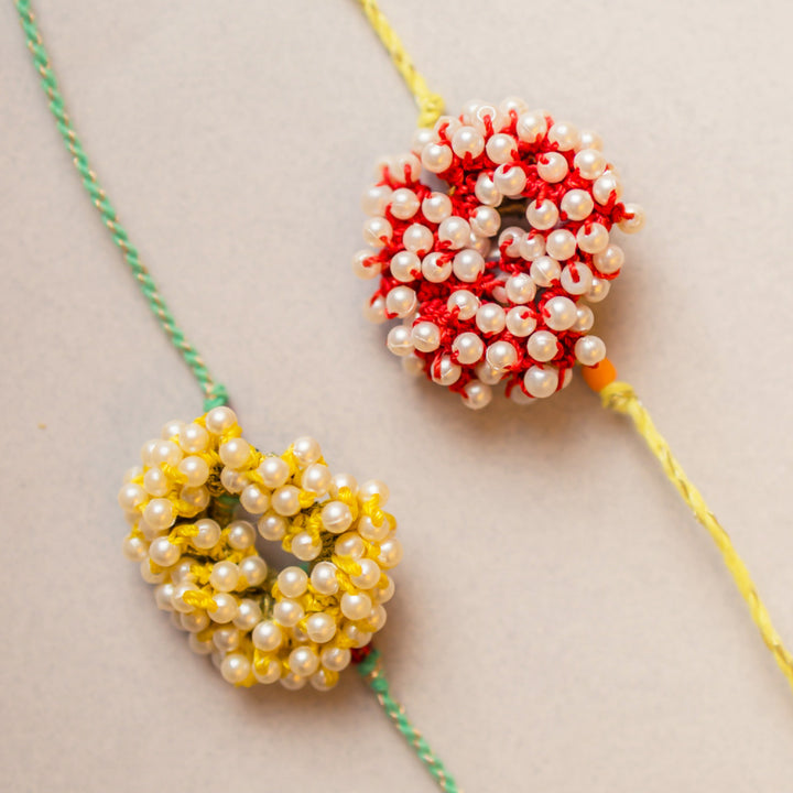 Intricate Crochet Beaded Coral Rakhi With Roli Chawal | Set of 2