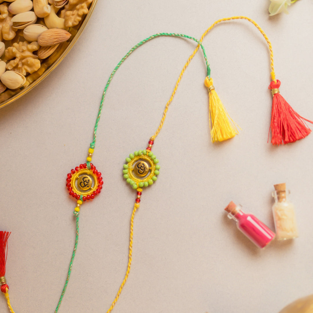 Intricate Beaded Crochet Om Aura Rakhi With Roli Chawal | Set of 2