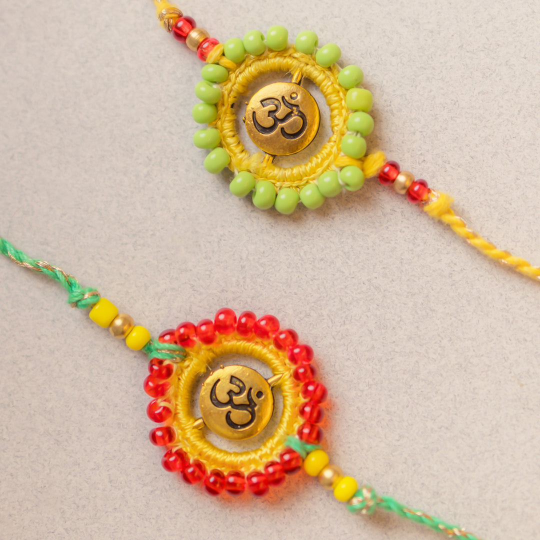 Intricate Beaded Crochet Om Aura Rakhi With Roli Chawal | Set of 2