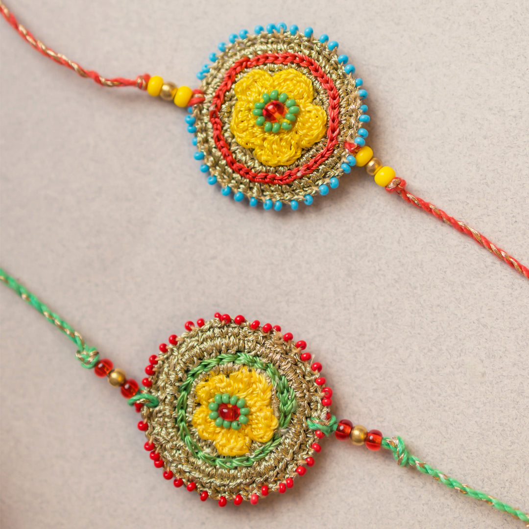 Intricate Beaded Crochet Heritage Flower Rakhi With Roli Chawal | Set of 2