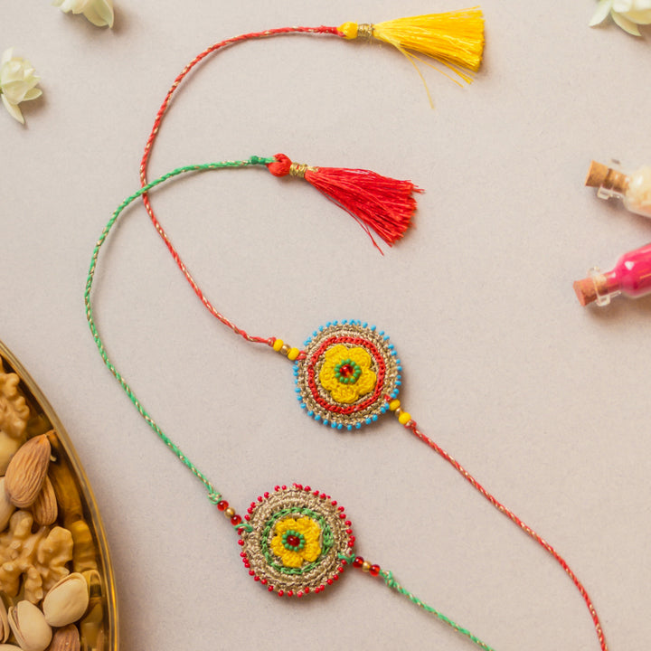 Intricate Beaded Crochet Heritage Flower Rakhi With Roli Chawal | Set of 2