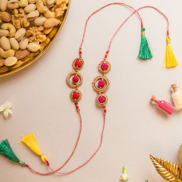 Intricate Beaded Crochet Sacred Loop Rakhi With Roli Chawal | Set of 2