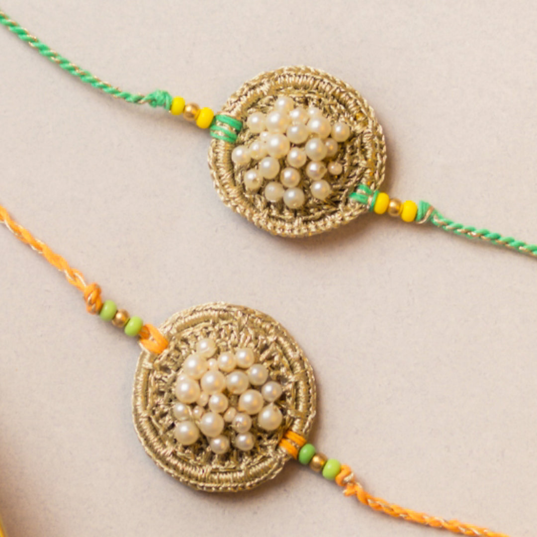 Intricate Beaded Crochet Pearl Knot Rakhi With Roli Chawal | Set of 2
