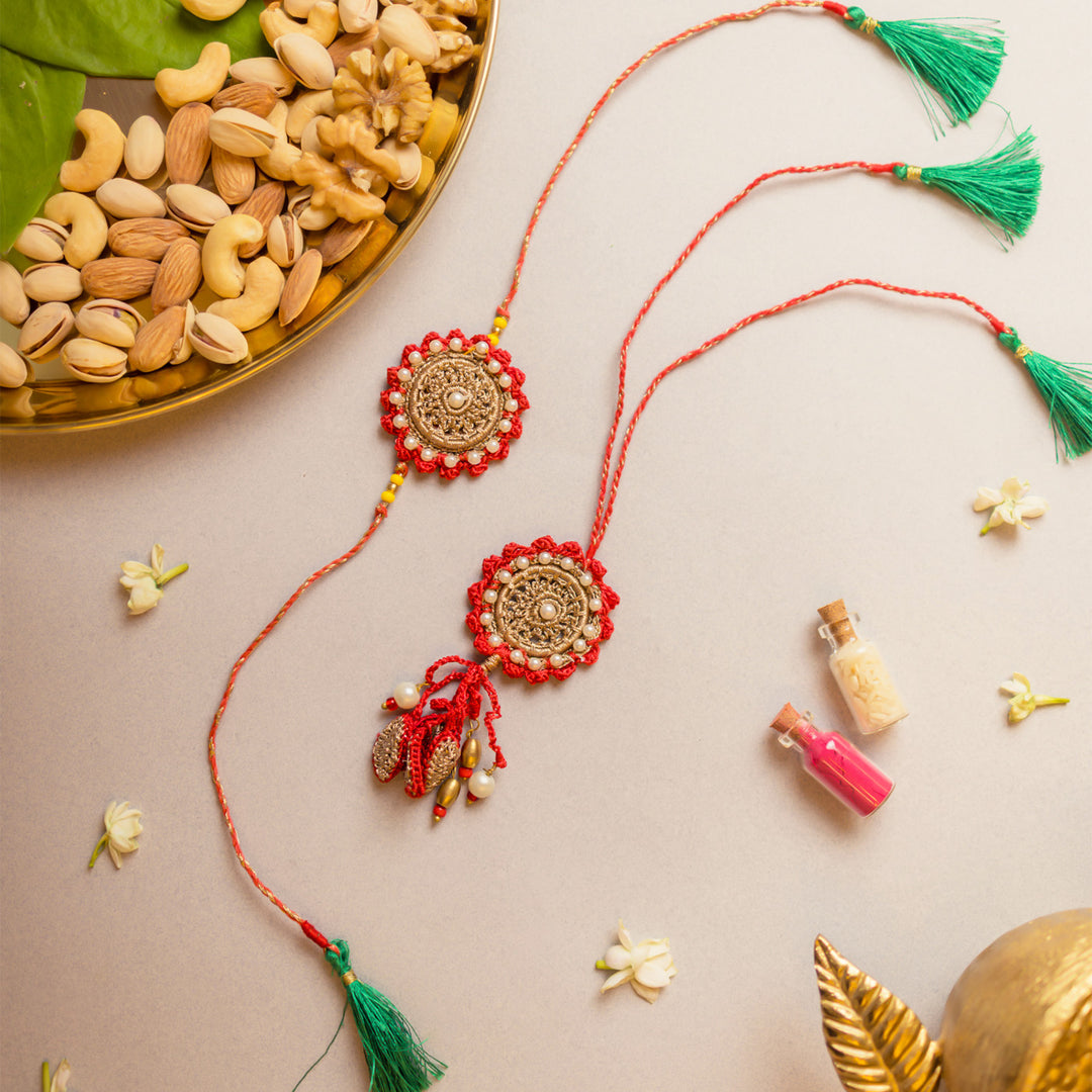 Intricate Crochet Festive Red Bhaiya Bhabhi Rakhi-Lumba Set With Roli Chawal | Set of 2