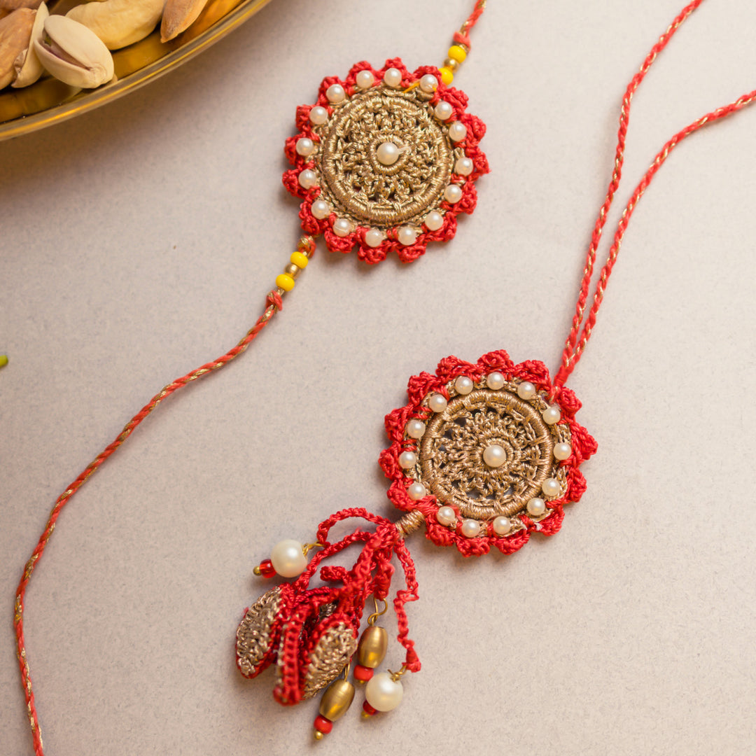 Intricate Crochet Festive Red Bhaiya Bhabhi Rakhi-Lumba Set With Roli Chawal | Set of 2
