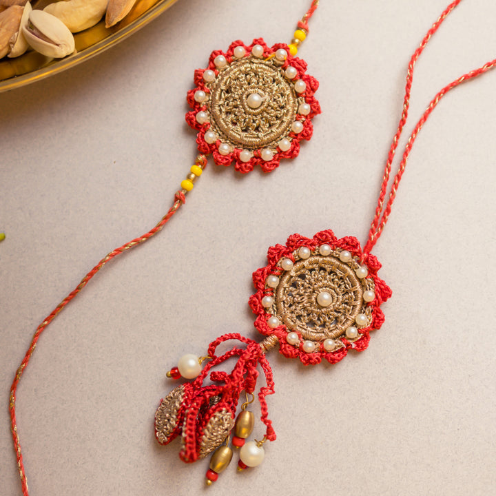 Intricate Crochet Festive Red Bhaiya Bhabhi Rakhi-Lumba Set With Roli Chawal | Set of 2