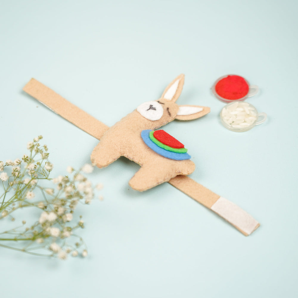 Handmade Lama Theme Felt Kids Rakhi With Roli Chawal - Flat Lay Showing Fastener Detail