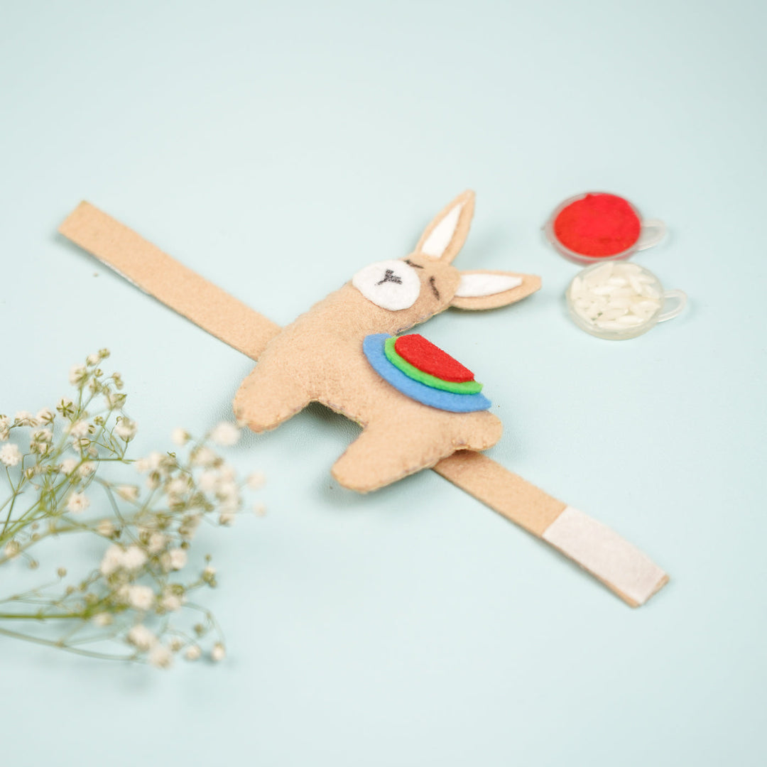 Handmade Lama Theme Felt Kids Rakhi With Roli Chawal - Flat Lay Showing Fastener Detail