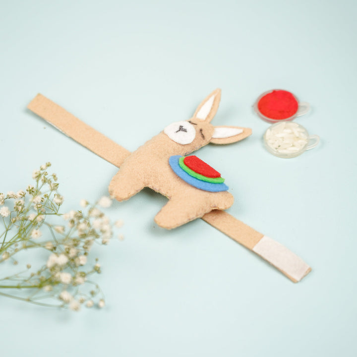Handmade Lama Theme Felt Kids Rakhi With Roli Chawal - Flat Lay Showing Fastener Detail