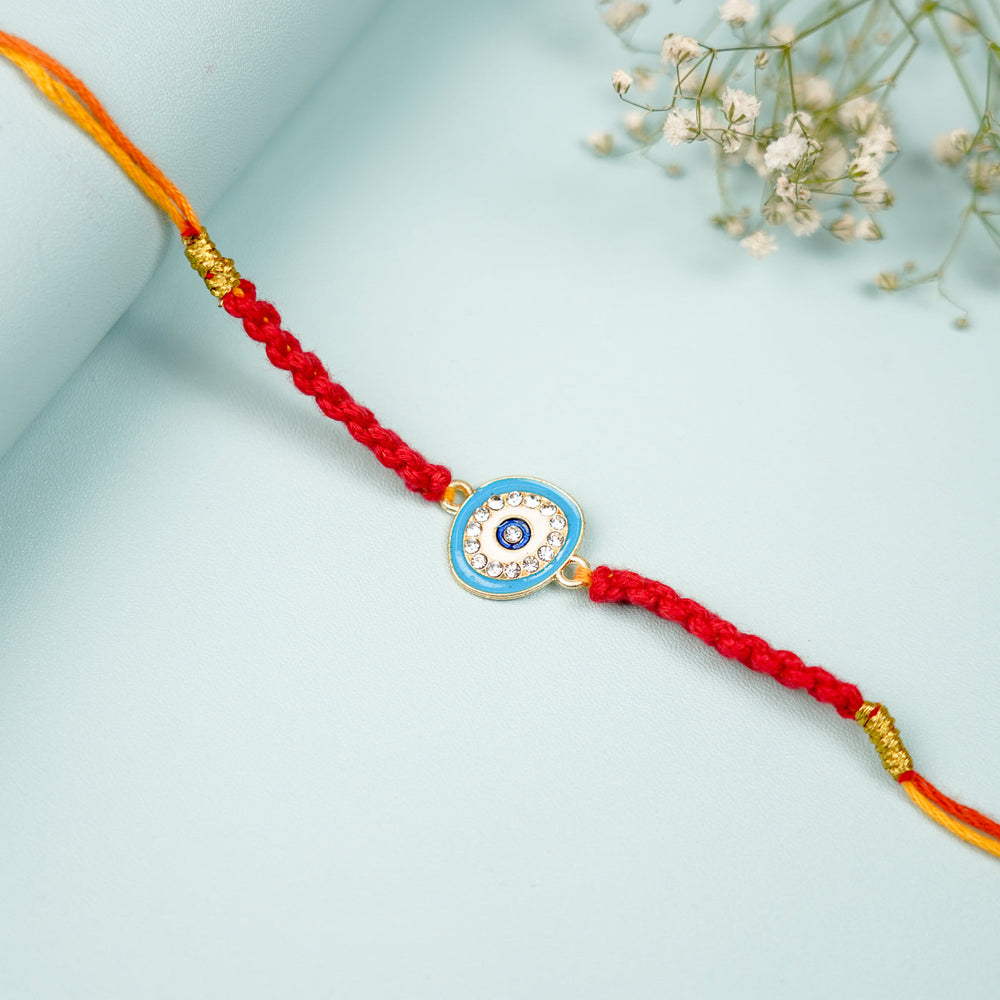 Customized Handmade Macrame Evil Eye Metal Rakhi With Roli Chawal - Close-up of middle charm