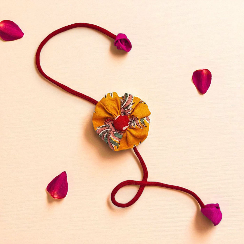 Handmade Flower Upcycled Fabric Rakhi With Roli Chawal For Brother - Single Floral Strap Front View