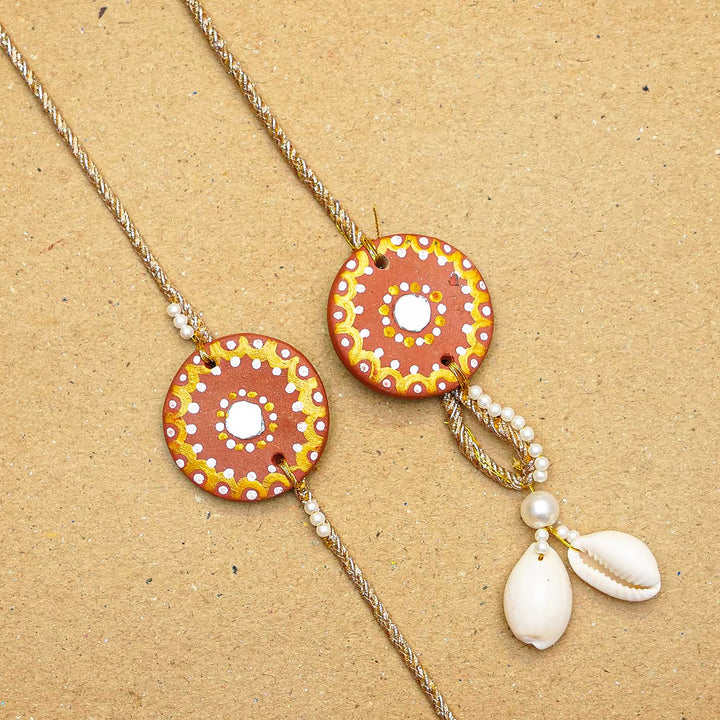 Terracotta Mandala Design Rakhi With Roli Chawal