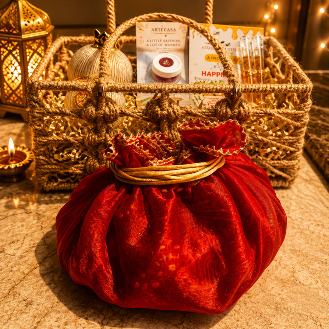 Utsav Jute Net Basket Diwali Gift Hamper With Red Toran Potli And Matka Soy Wax Candle For Festive Gifting