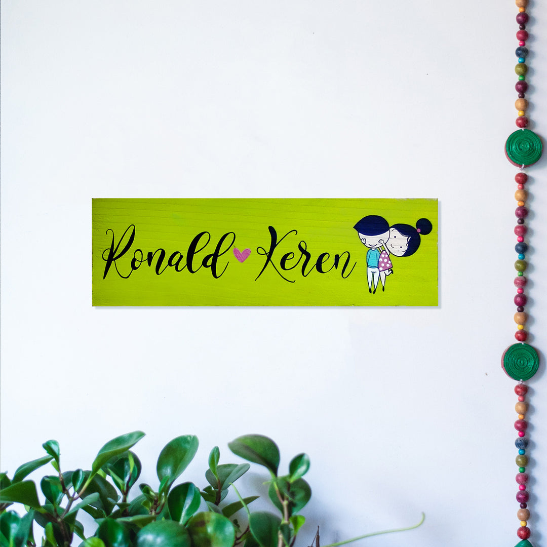 Personalised Handpainted Name Plate For Couples - Mounted on White Wall with Decor