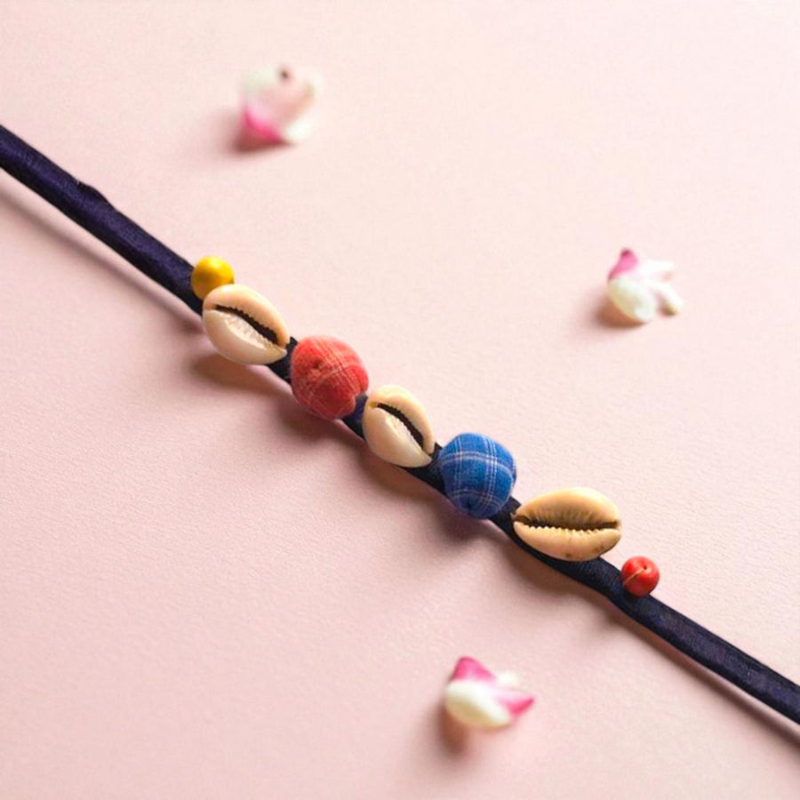 Handmade Beaded Shell Design Upcycled Fabric Rakhi With Roli Chawal For Brother 1 - Close-up Detail View