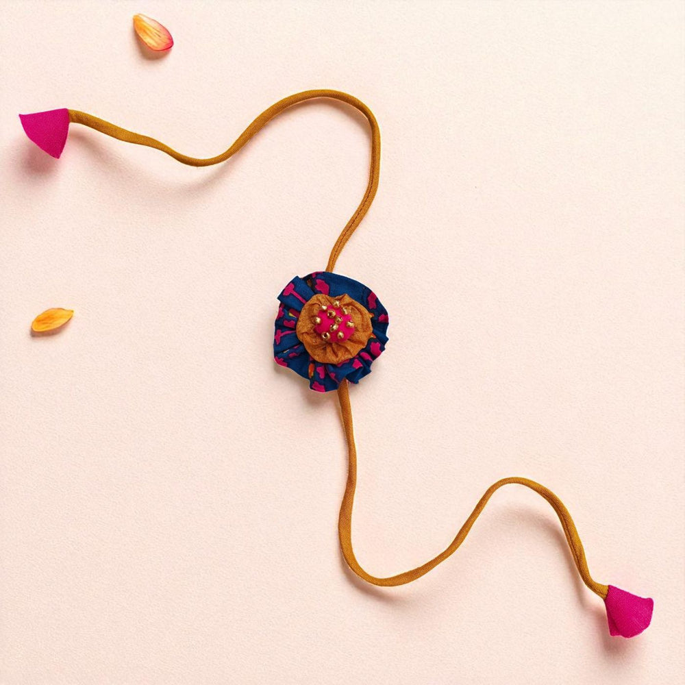 Handmade Beaded Flower Design Upcycled Fabric Rakhi With Roli Chawal For Brother - Full Length View