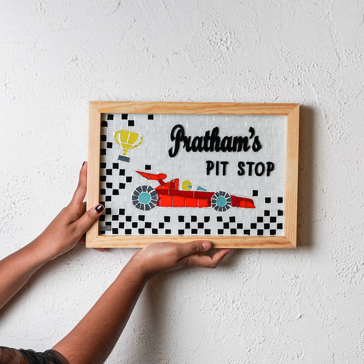 Handcrafted Mosaic Personalized Name Plate With Wooden Frame 5 - Held in Hands Against Wall