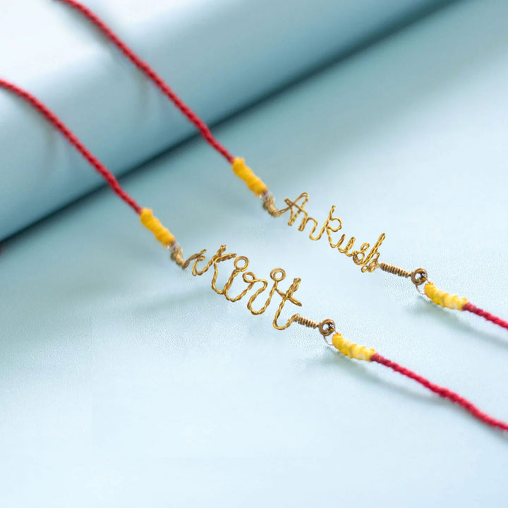 Personalized Brass Lettering Bhaiya Bhabhi Rakhi Set With Roli Chawal | Set of 2