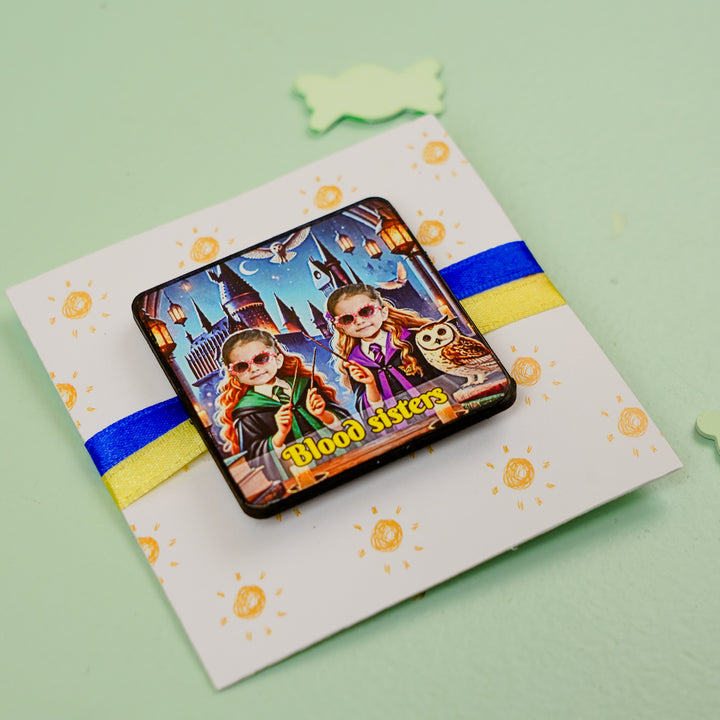 Photo Personalized Handmade Reusable Caricature Blood Sisters Mdf Wood Rakhi With Roli Chawal For Sisters - Angled view of badge on card