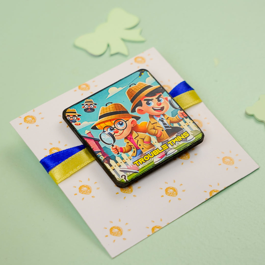 Trouble Twins Reusable Mdf Wood Rakhi With Roli Chawal For Siblings - Angled View on Gift Card