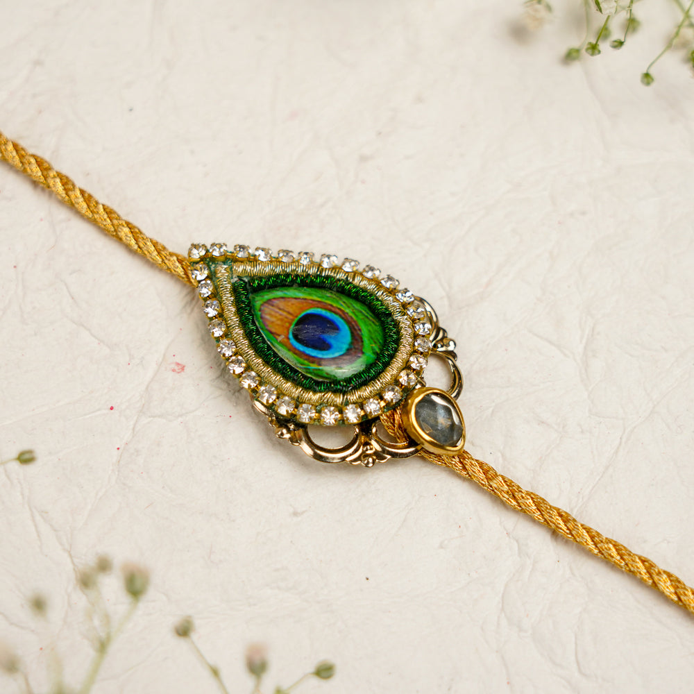 Peacock Pearm And Dori Bracelet Rakhi With Roli Chawal For Bhaiya And Bhabhi - Close-up of Gold Thread Bracelet