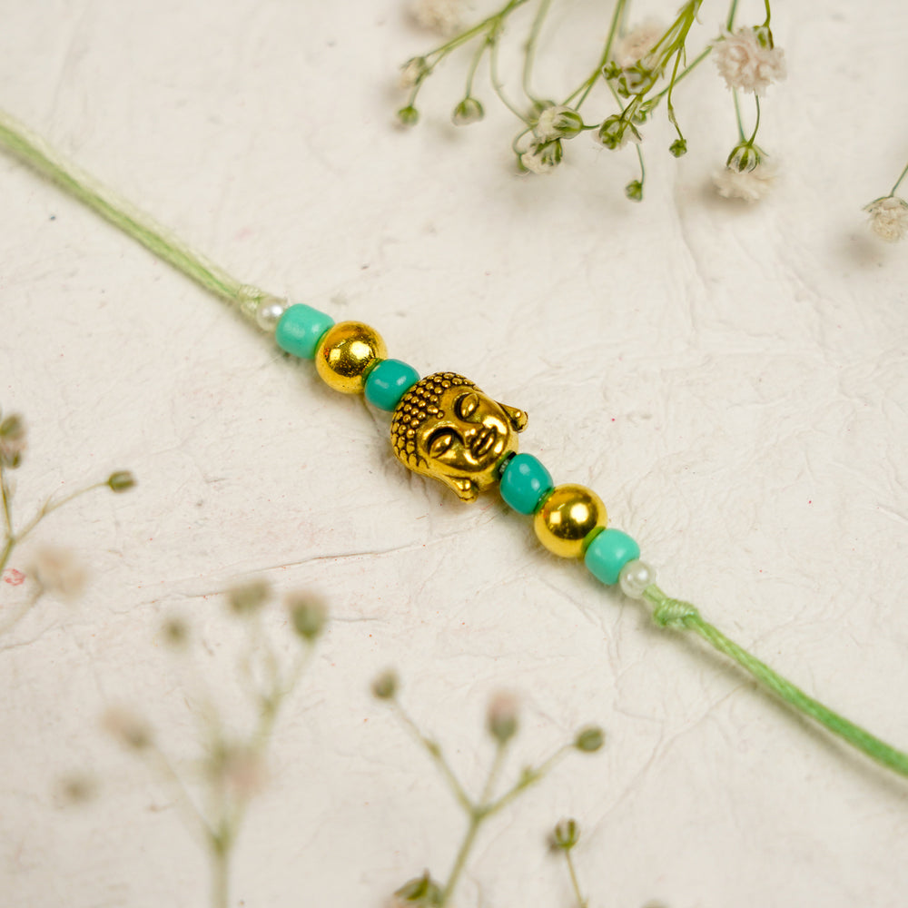Green Pink Pearl And Buddha Charm Resin Bracelet Rakhi With Roli Chawal For Bhaiya And Bhabhi - Beaded Element Close-up