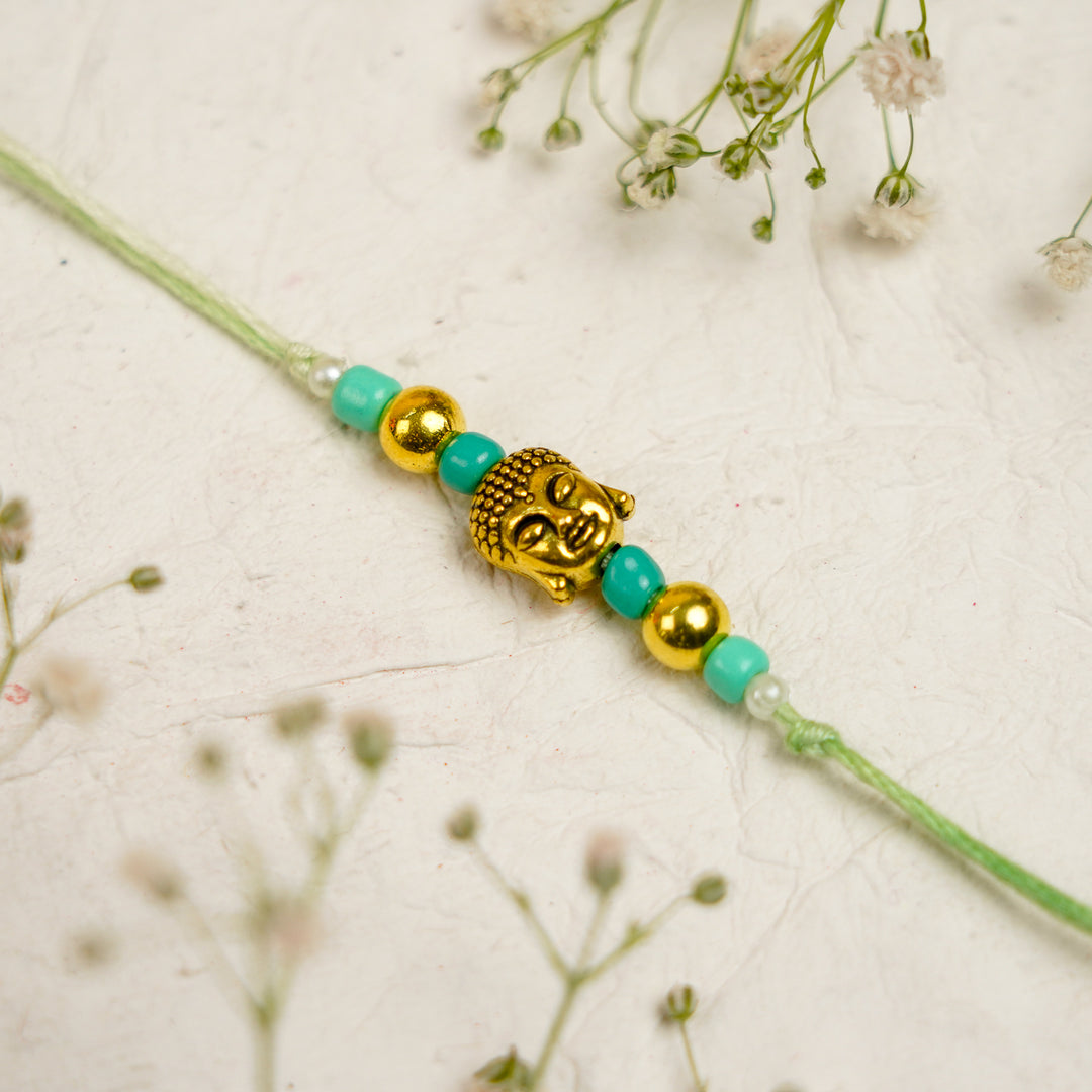 Green Pink Pearl And Buddha Charm Resin Bracelet Rakhi With Roli Chawal For Bhaiya And Bhabhi - Beaded Element Close-up