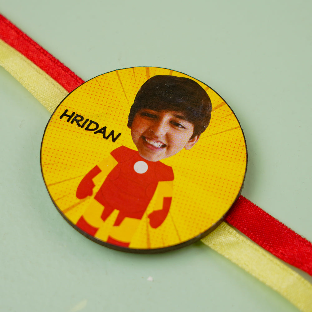 Photo Personalized Handmade Reusable Caricature Iron Man Mdf Wood Kids Rakhi With Roli Chawal - Close-up of Personalized Rakhi
