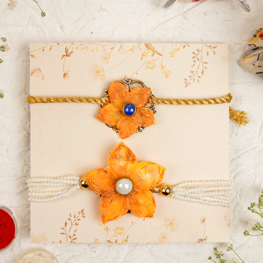 Orange Pearl And Dori Resin Bracelet Rakhi With Roli Chawal For Bhaiya And Bhabhi - Pair Display on Decorative Card