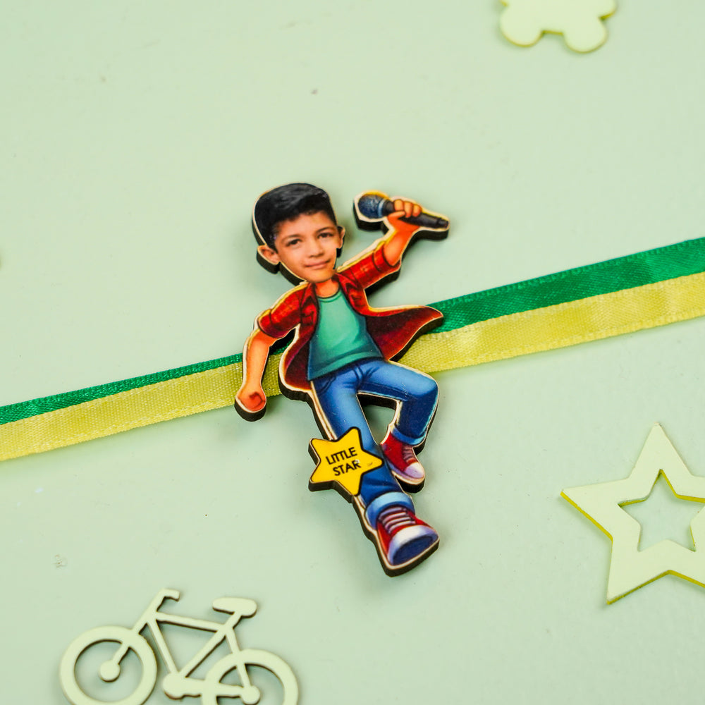 Photo Personalized Handmade Reusable Caricature Little Star Mdf Wood Kids Rakhi With Roli Chawal - Flat Lay on Surface