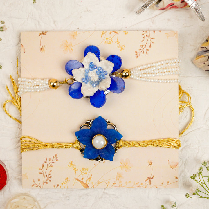 Blue White Pearls And Zari Resin Bracelet Rakhi With Roli Chawal For Bhaiya And Bhabhi - Front View with Both Rakhis