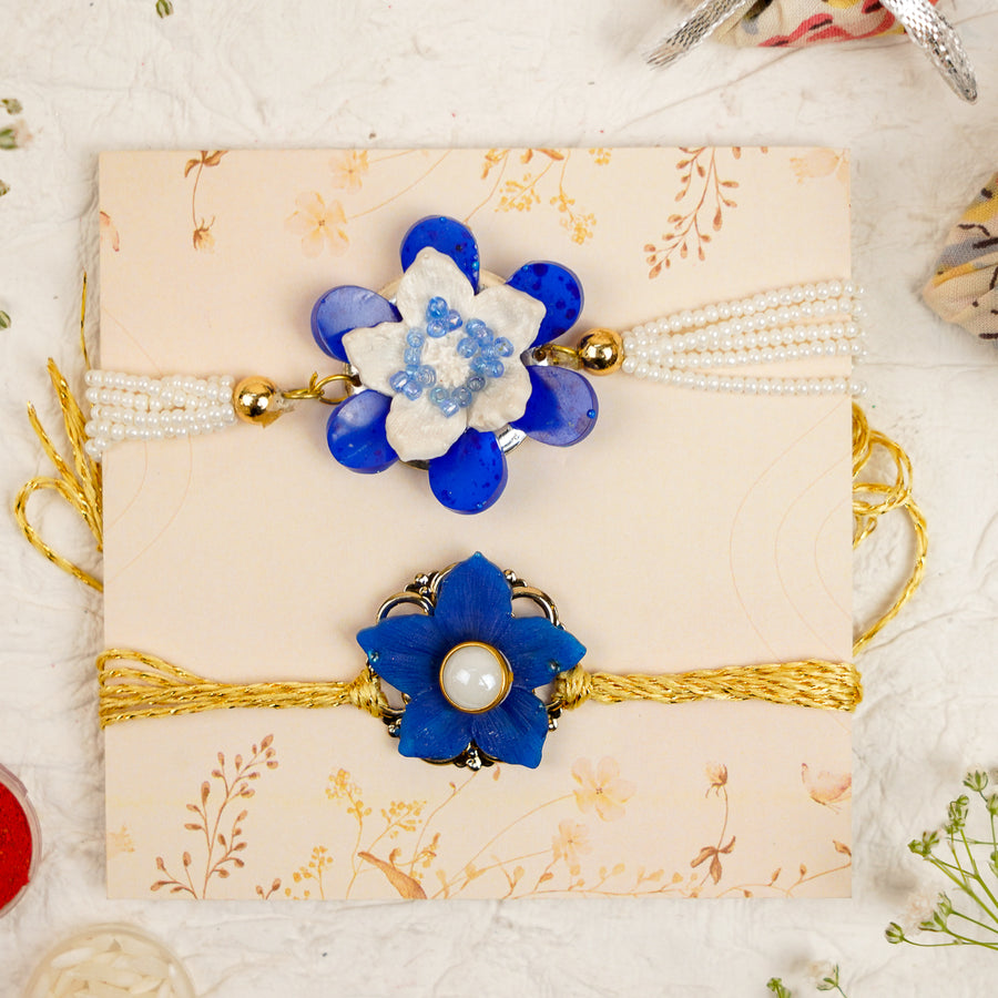 Blue White Pearls And Zari Resin Bracelet Rakhi With Roli Chawal For Bhaiya And Bhabhi - Front View with Both Rakhis