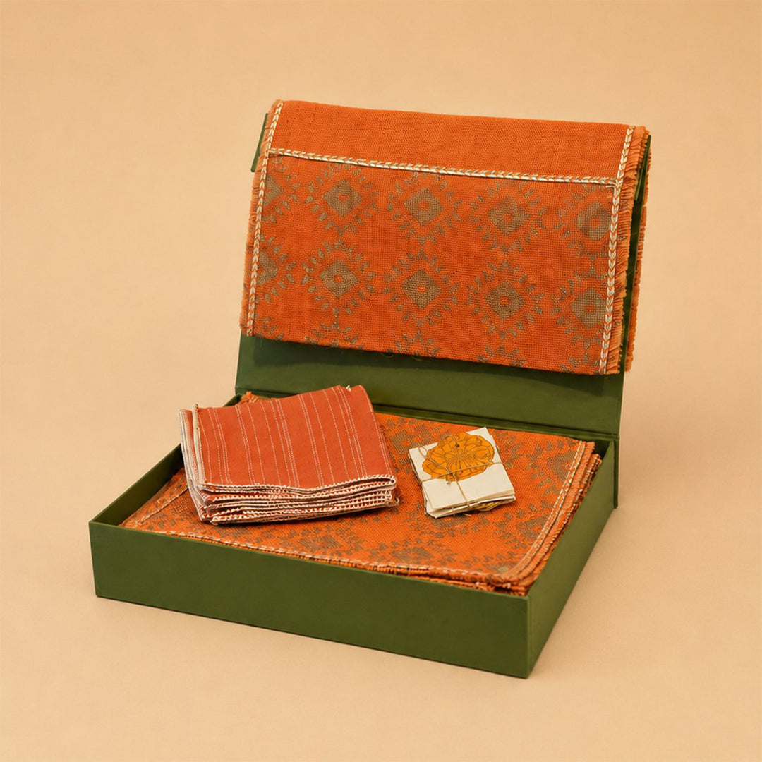 Handcrafted Orange Screen Printed Jute Table Linen Gift Hamper With Gota Detailing For Festive Gifting