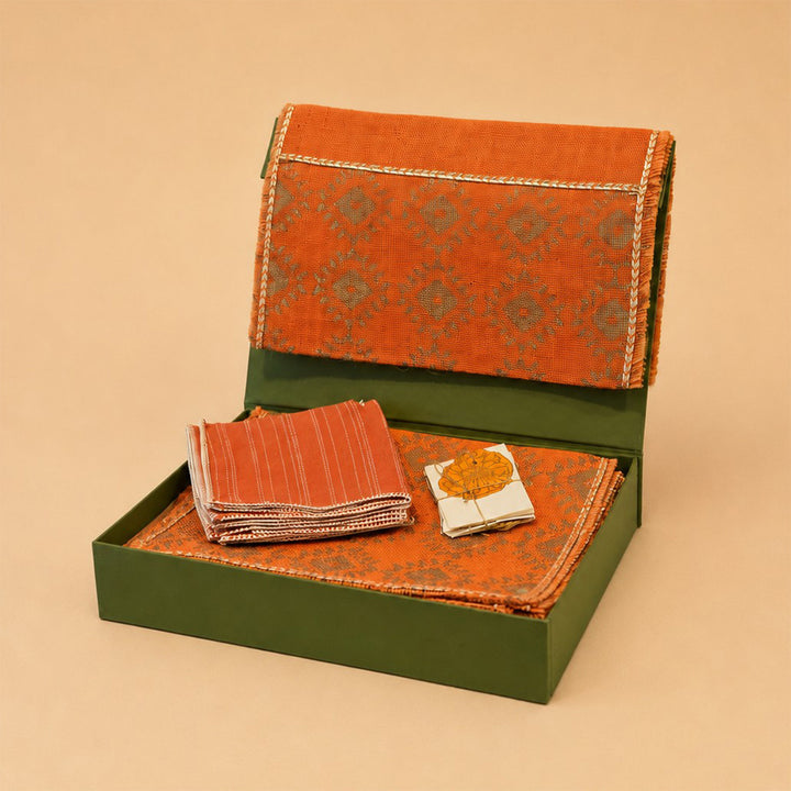 Handcrafted Orange Screen Printed Jute Table Linen Gift Hamper With Gota Detailing For Festive Gifting