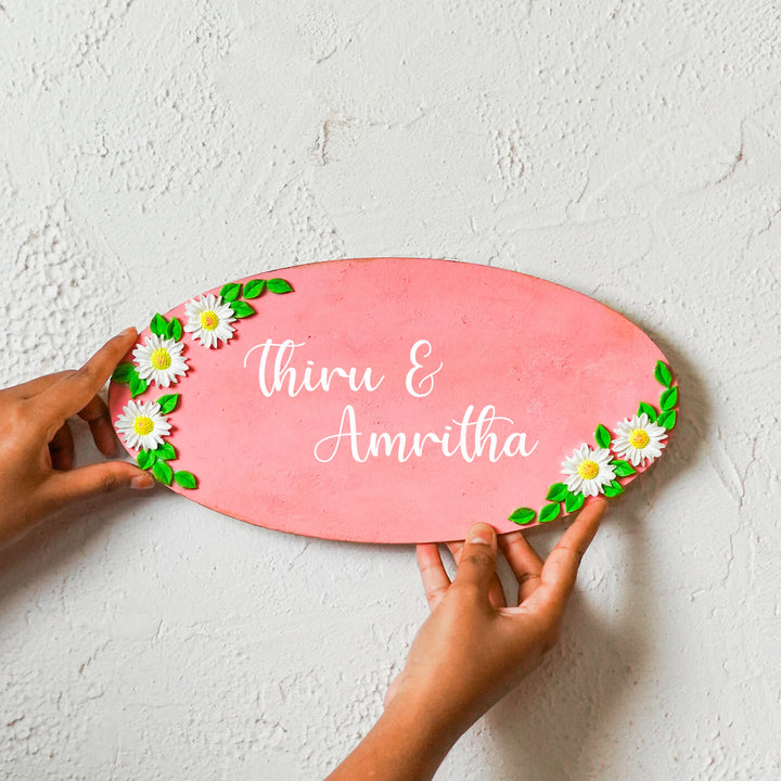 Handcrafted Personalized Wooden Floral Oval Name Plate 1 - Name Personalization Example Held by Hands