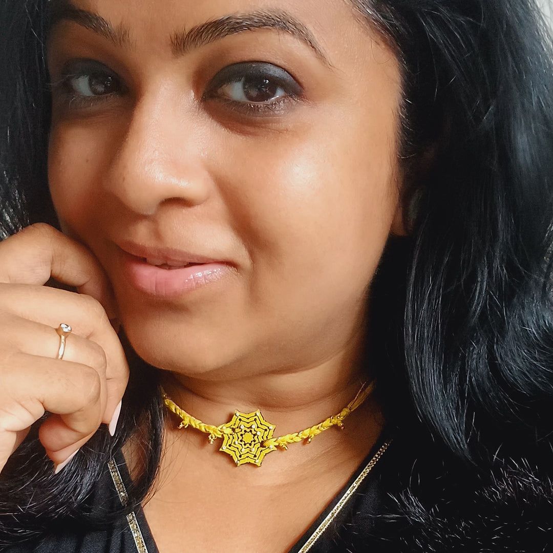 Handmade Yellow Star Shape Ghungroo And Beads Wooden Bhaiya Bhabhi Rakhi With Roli Chawal - Model Wearing Necklace Close-up